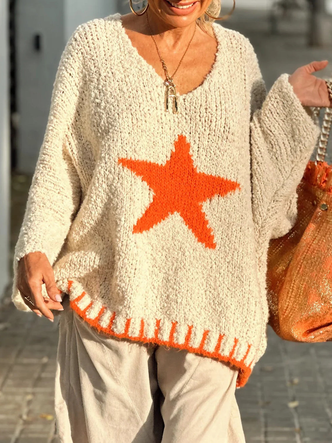 Pull oversize à manches longues et col en V avec étoiles