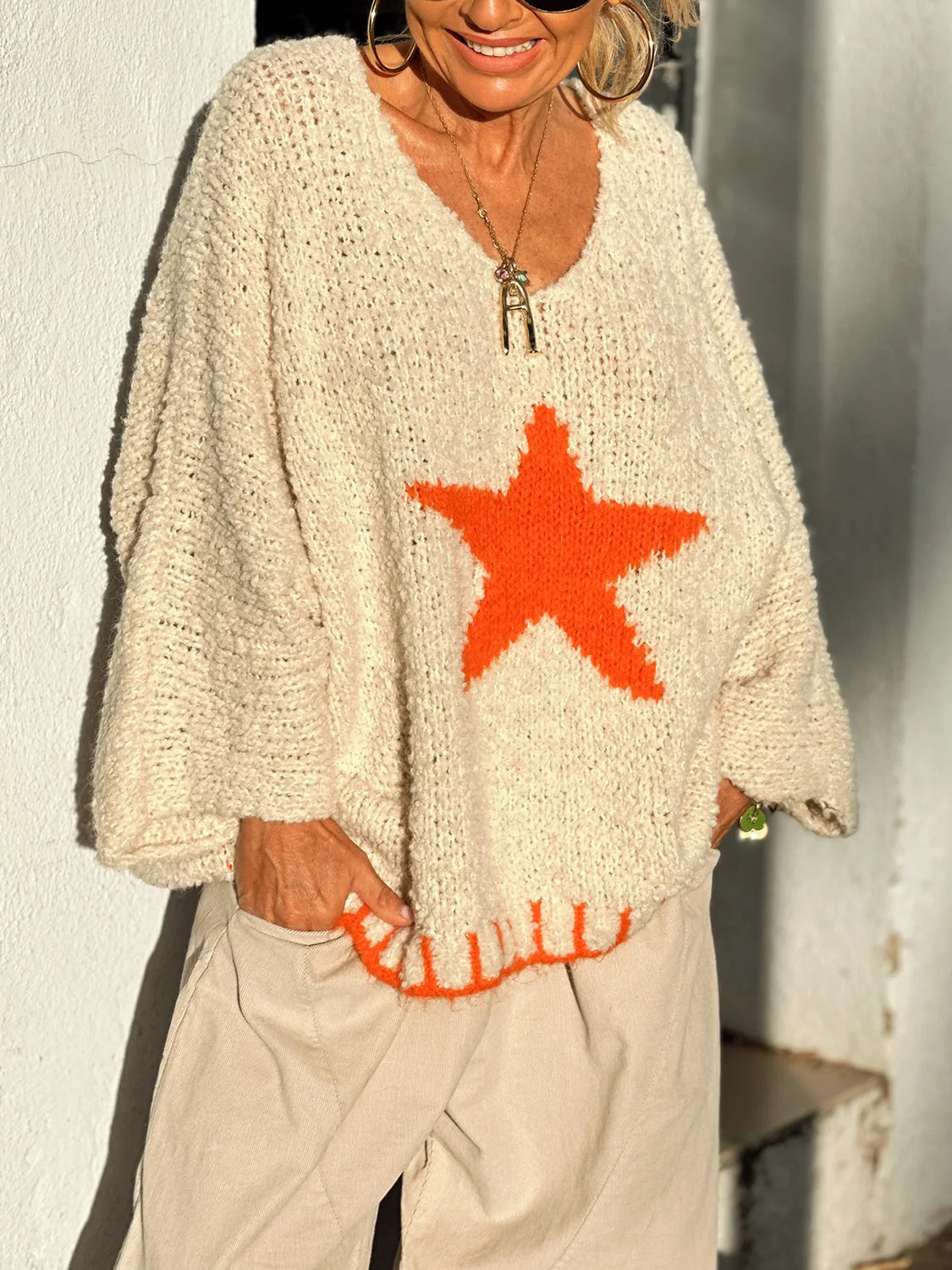 Pull oversize à manches longues et col en V avec étoiles