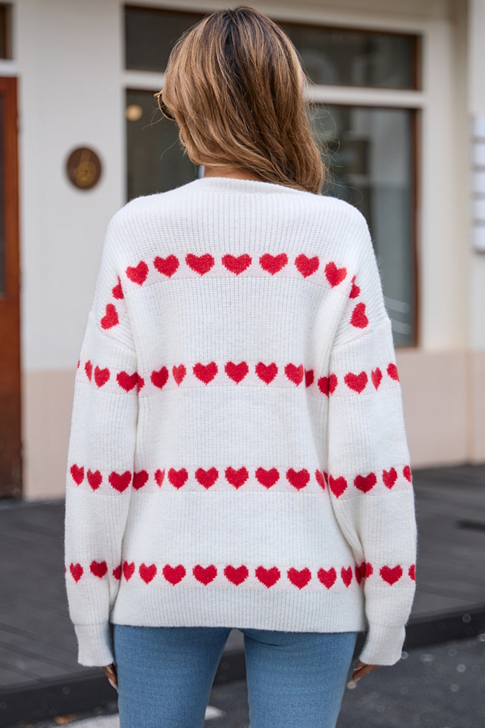 Pull à manches longues et col rond avec ailes d'ange et cœur