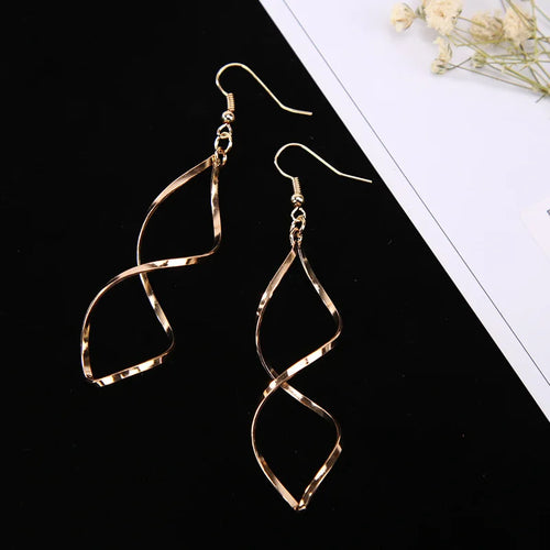 Boucles d'oreilles pendantes en spirale simples et tendance pour femmes, longues boucles d'oreilles pendantes incurvées 