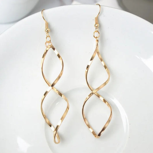 Boucles d'oreilles pendantes en spirale simples et tendance pour femmes, longues boucles d'oreilles pendantes incurvées 